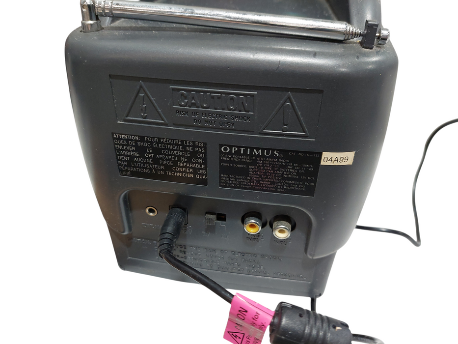 Optimus 5" Black & White Portable TV with AM/FM Radio  =